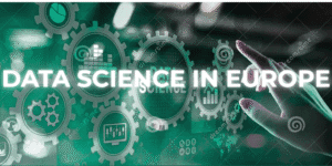 Hand pointing at virtual gears labeled “Data Science in Europe” with icons representing data charts, analytics, and digital technology.